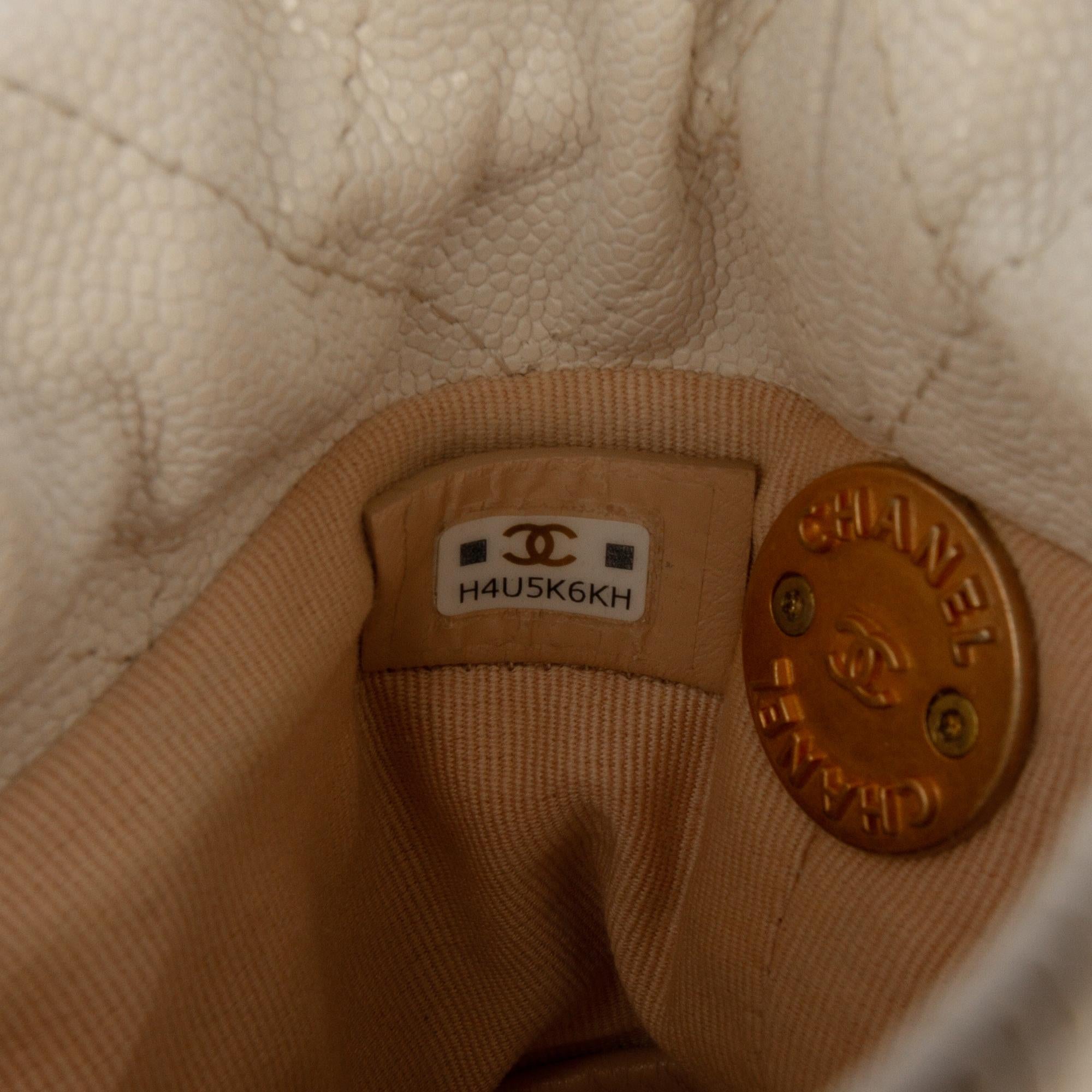Chanel Mini Quilted Caviar Twist Your Buttons Drawstring Bucket Bag
