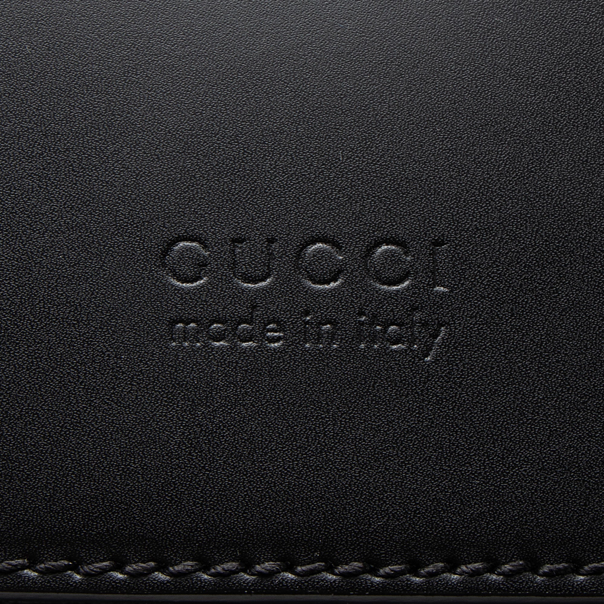 Gucci GG Supreme Medium Flap Backpack