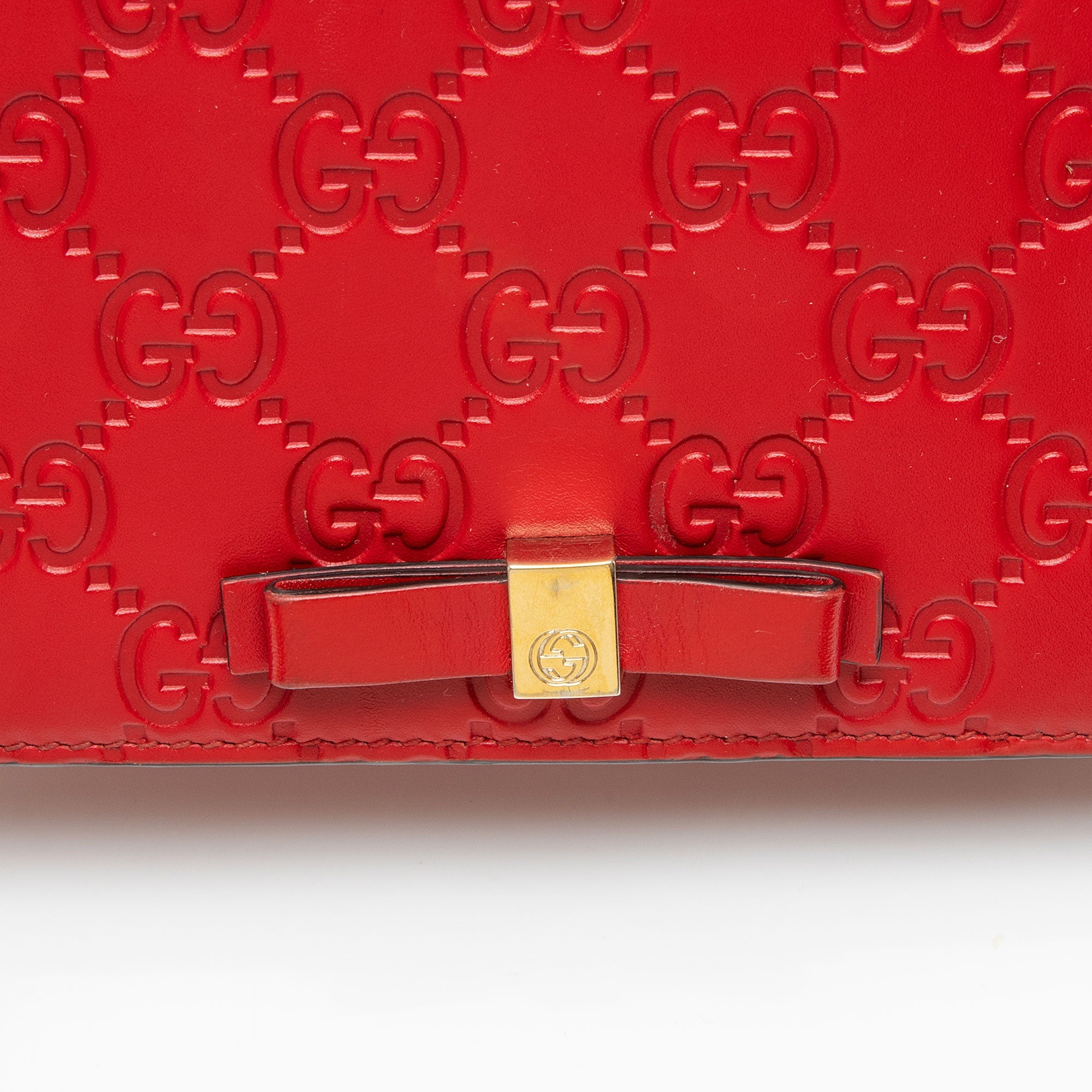 Gucci Guccissima Leather Signature Bow Mini Wallet on Chain