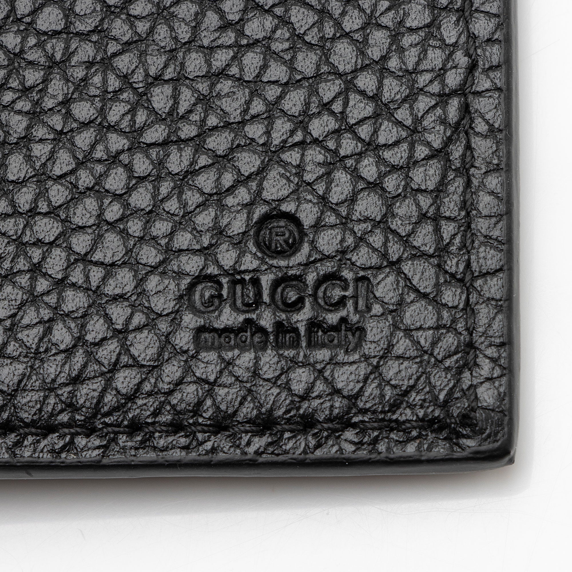 Gucci Jumbo GG Embossed Leather Bifold Wallet