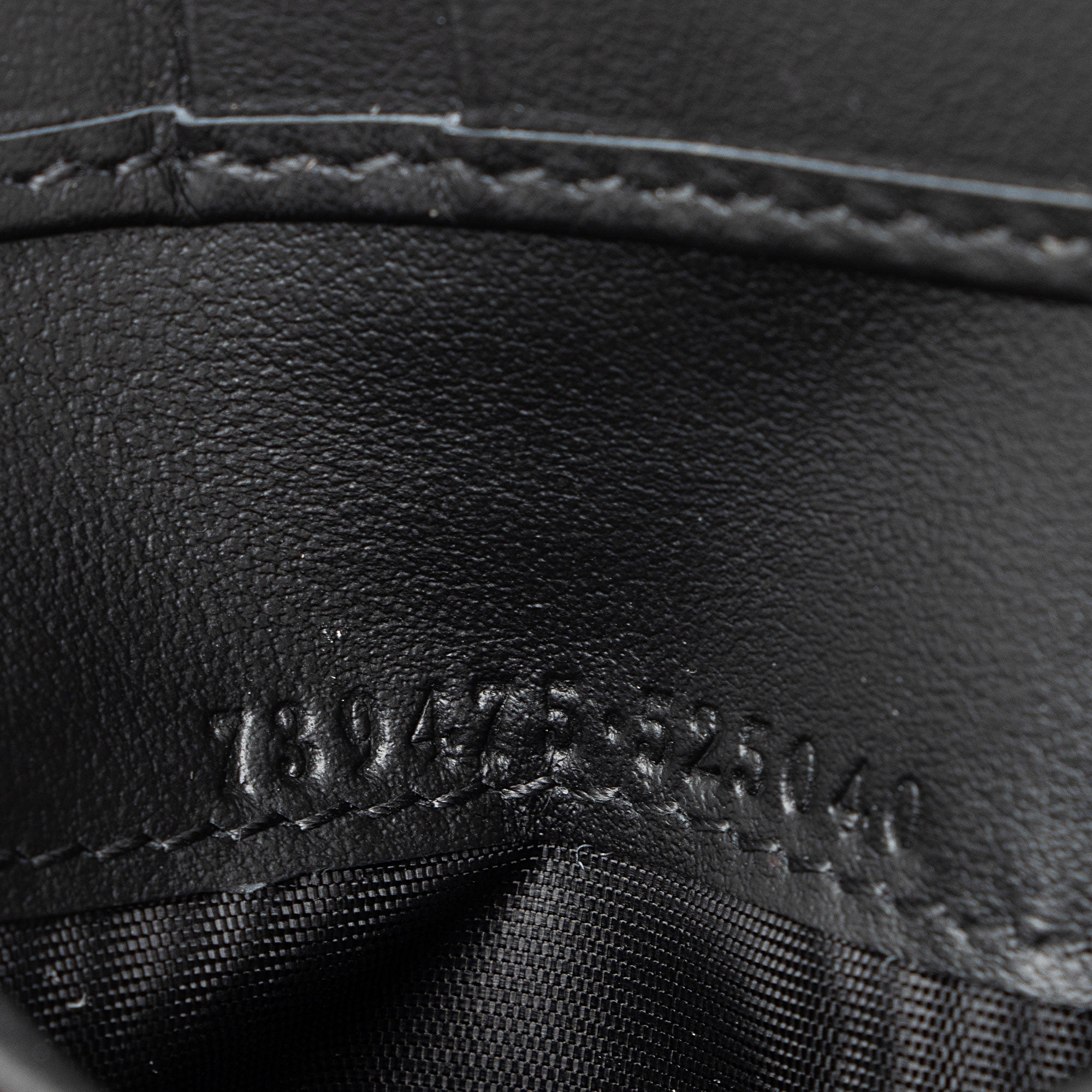 Gucci Jumbo GG Embossed Leather Bifold Wallet