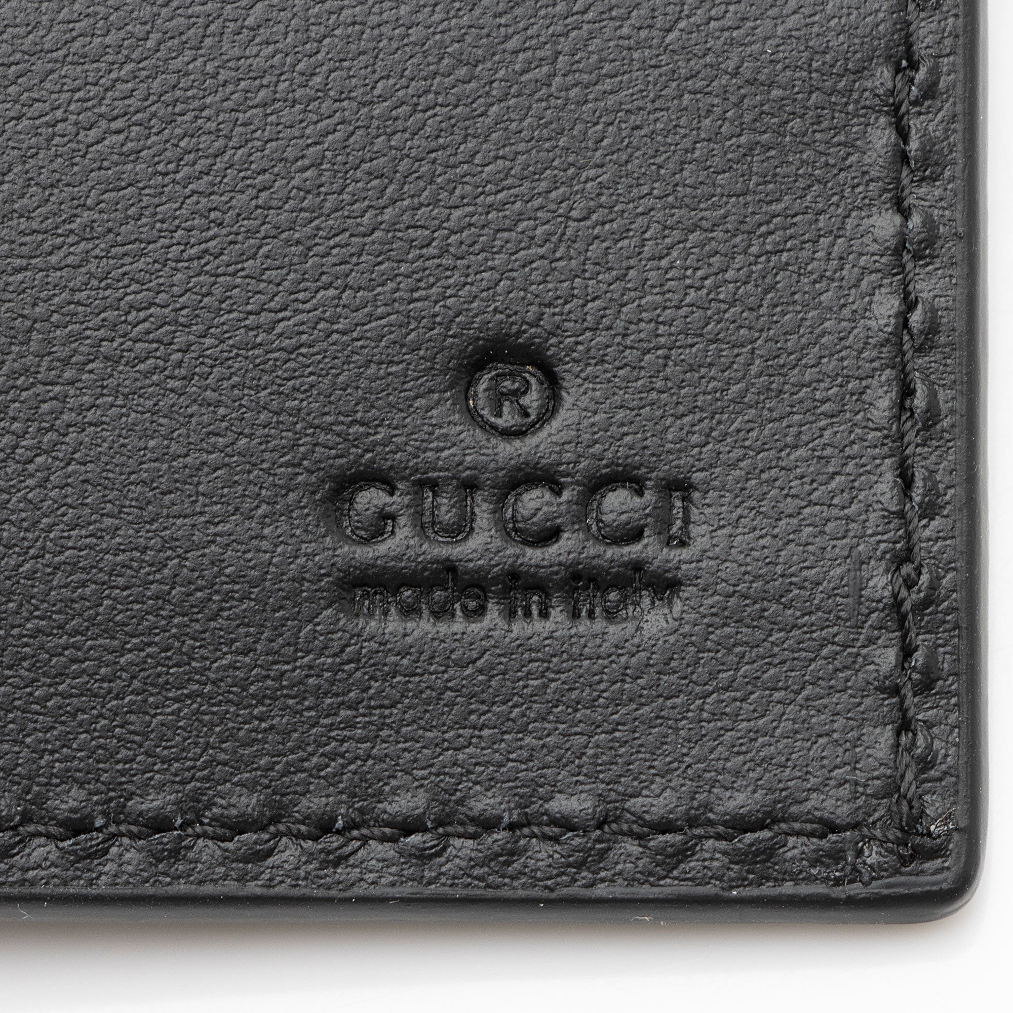 Gucci Jumbo GG Embossed Leather Bifold Wallet