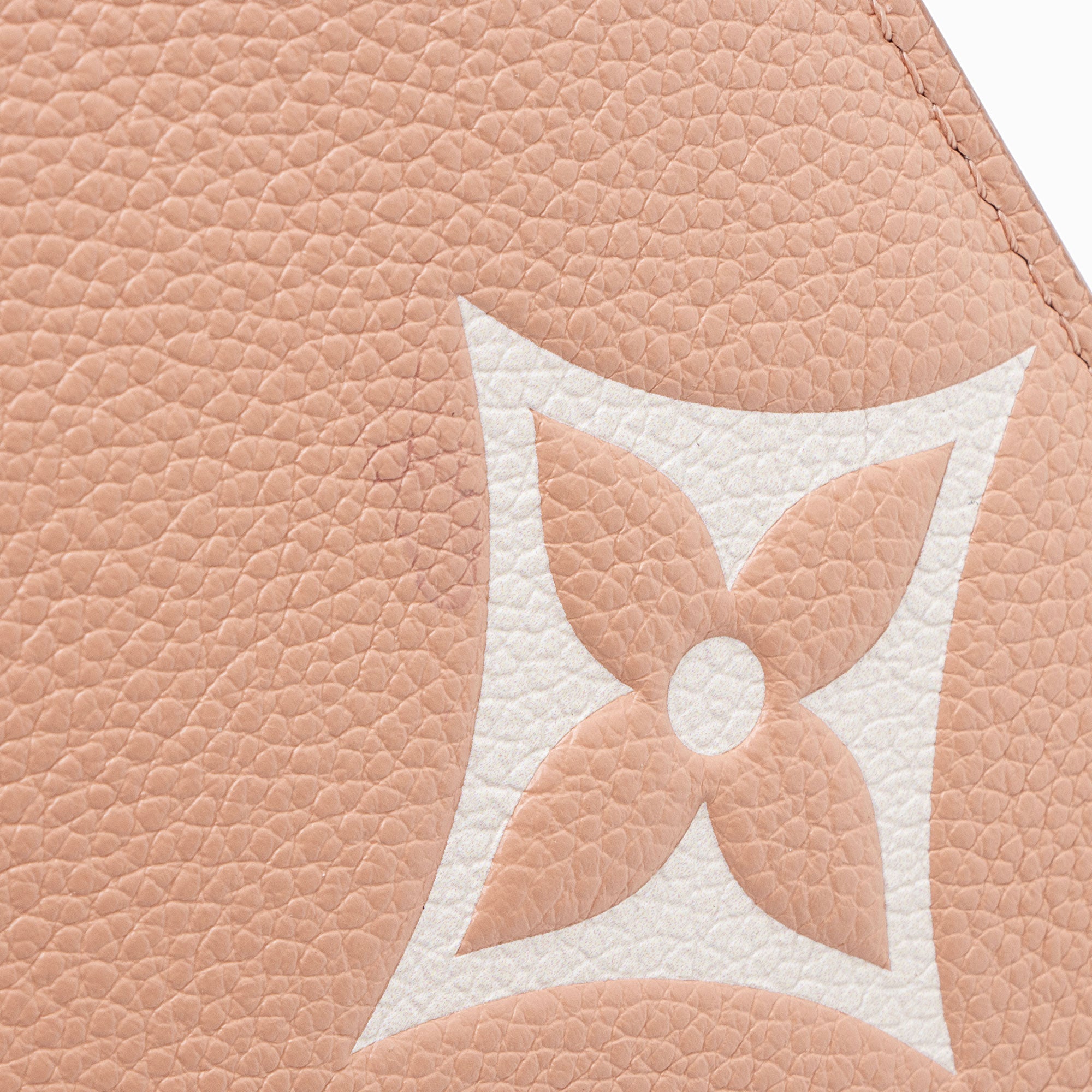 Louis Vuiiton Giant Monogram Empreinte Bicolor Neverfull MM Pochette