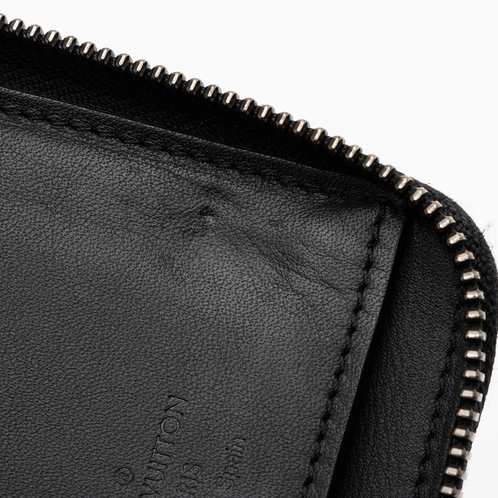 Louis Vuitton Damier Infini Vertical Zippy Wallet