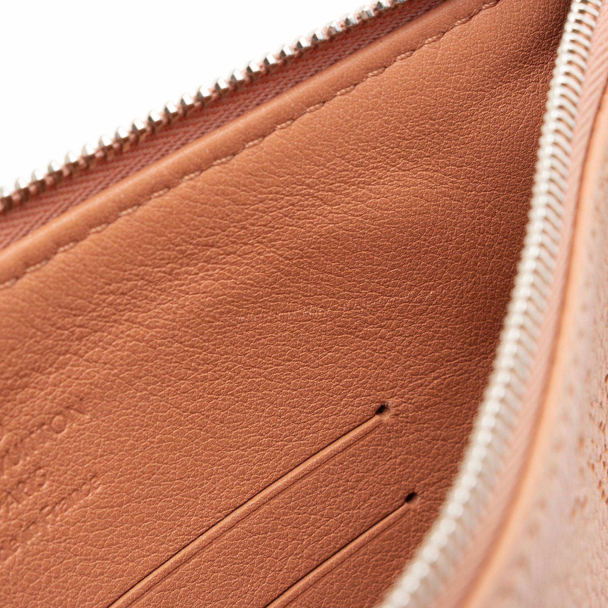 Louis Vuitton Mahina Leather Pochette