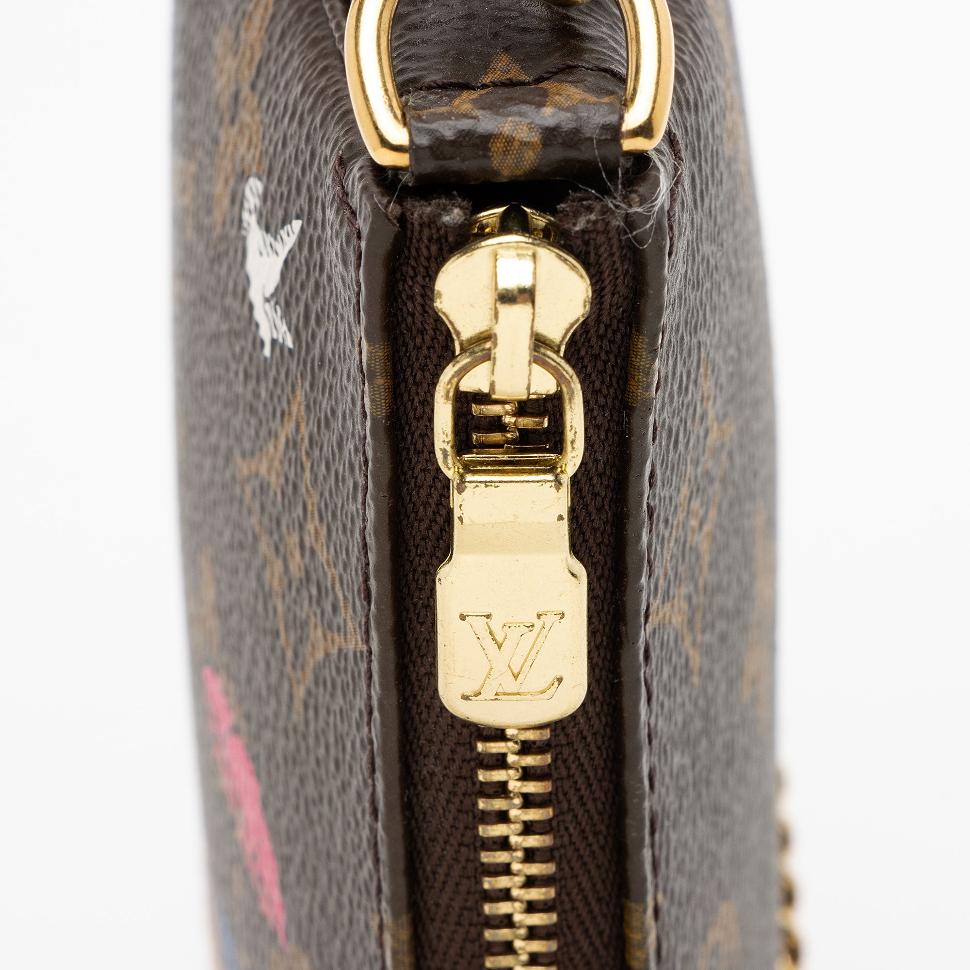Louis Vuitton Limited Edition Monogram Canvas Animation Evasion Mini Pochette Accessoires