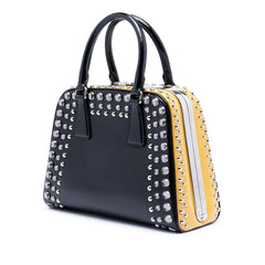 Prada Small Studded Saffiano Vernice Frame Top Handle Bag