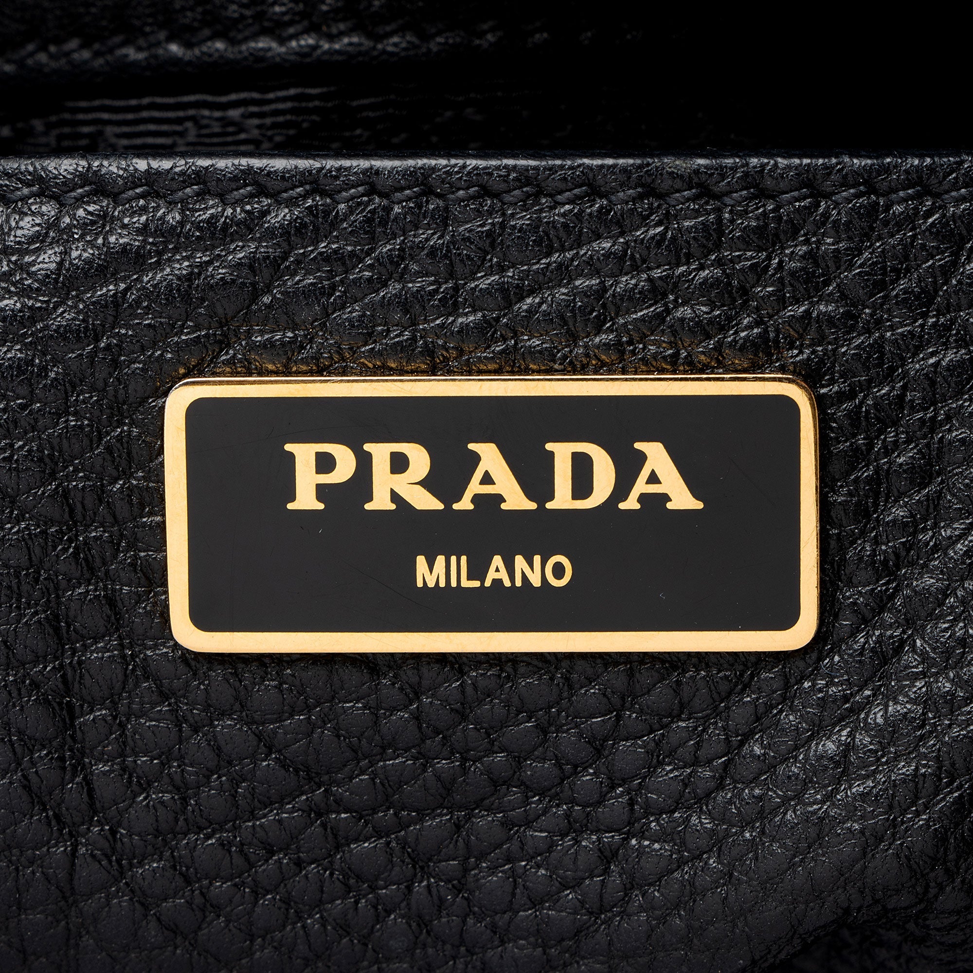 Prada Vitello Daino Drawstring Flap Backpack