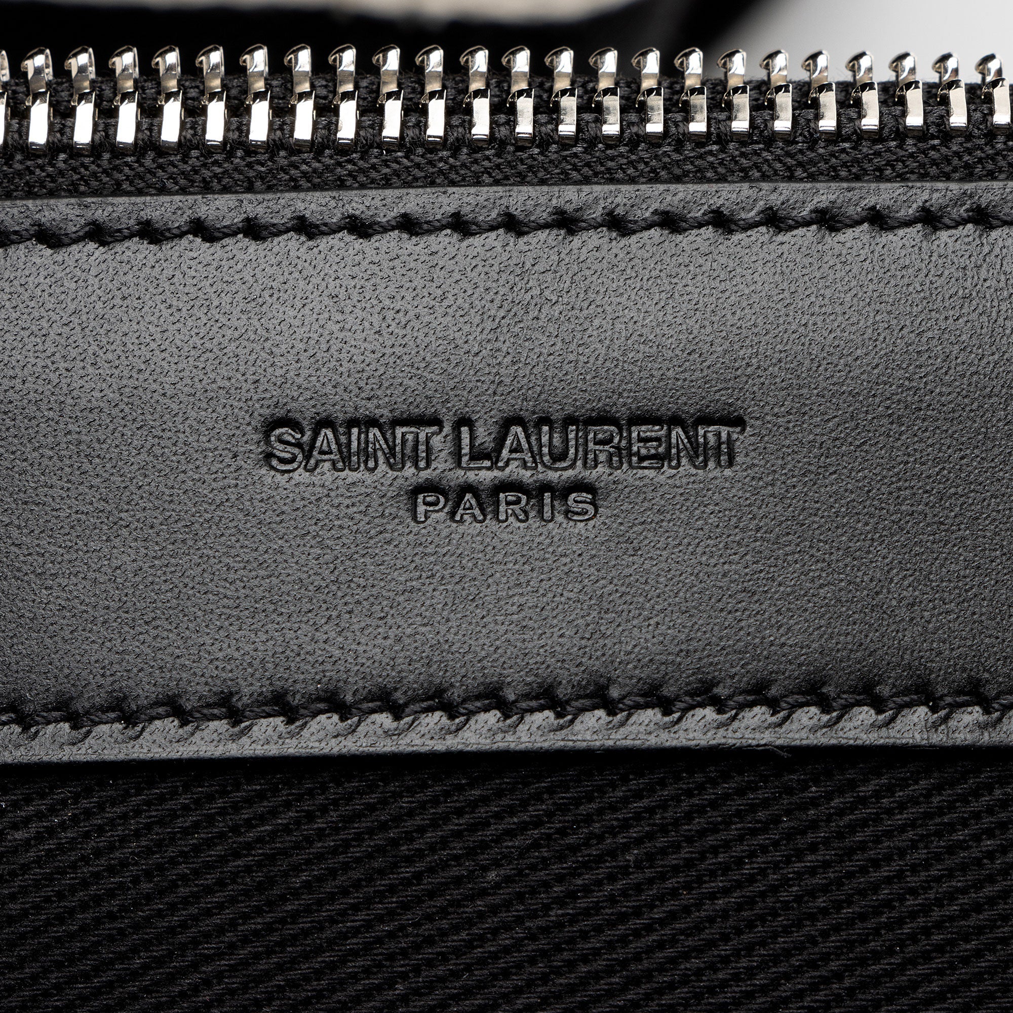 Saint Laurent Canvas Embroidered Rive Gauche Drawstring Sling Bag